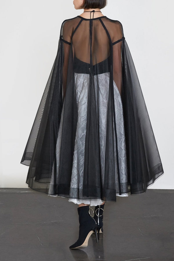 Campbell Cape - ALBOUSHIYA - district 5 - dubai - riyadh - abaya - dresses - designers - evening wear - luxury - elegance - craftsmanship - gowns - cocktail dresses - collections - georges
