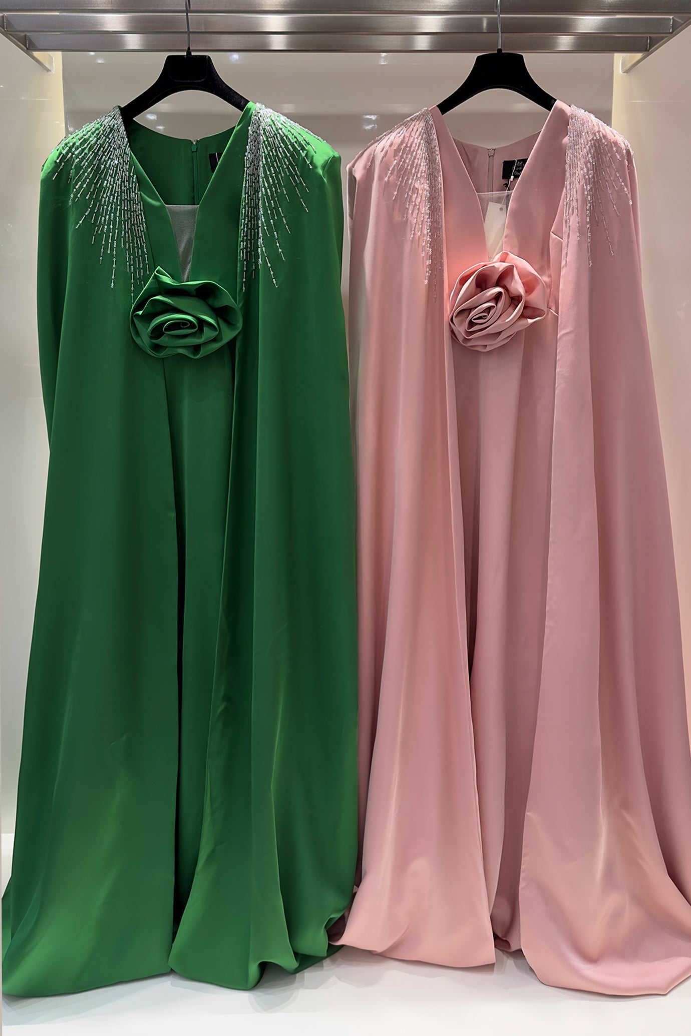 V-Neckline Sleeveless Gown With Long Cape